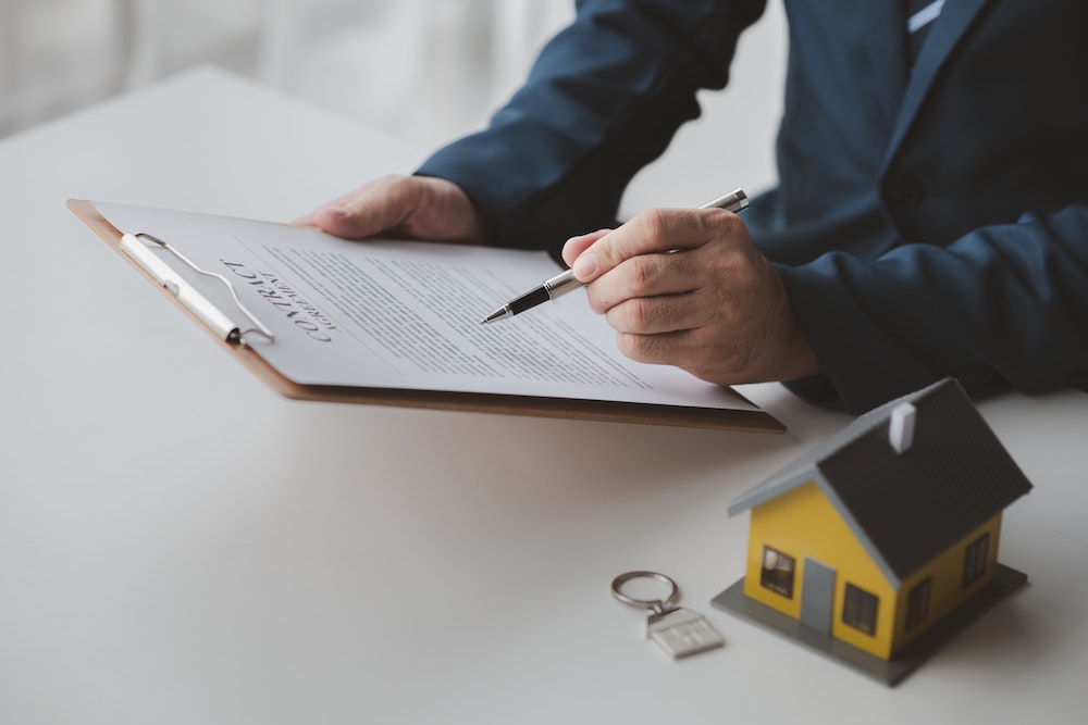 Comprendre le Contrat d'Achat Immobilier : Un Guide Juridique